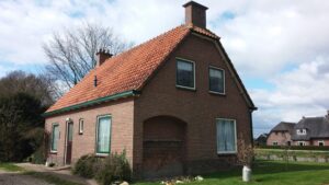 Fusillademuur in het woonhuis